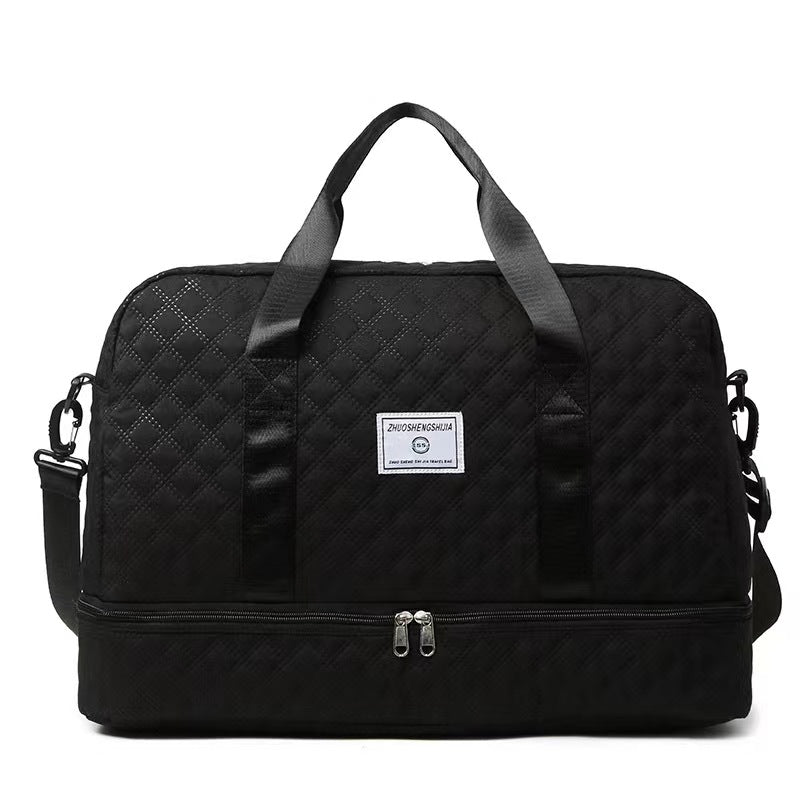 Black quilted travel bag on sale